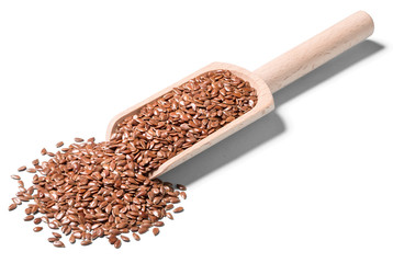 dried flax seeds on white