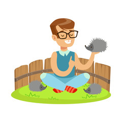 Happy little boy sitting on green grass and playing with hedgehogs in a mini zoo. Colorful cartoon character vector Illustration