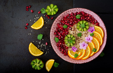 Tasty and healthy oatmeal porridge with fruit, berry and flax seeds. Healthy breakfast. Fitness food. Proper nutrition. Flat lay. Top view