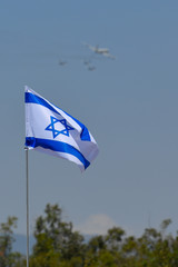 A military refueling plane refuels three F-15s in the air during Israeli 69st independent day