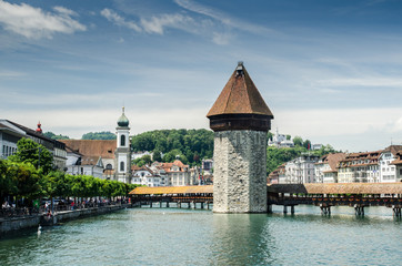 Water Tower and Chapel Bridge (Kapellbrucke) - covered wooden footbridge in Lucerne, Switzerland