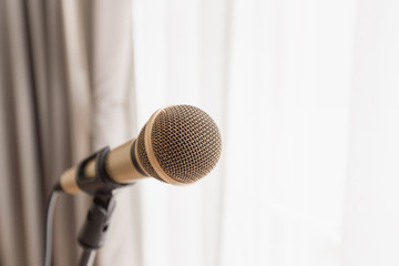 Fototapeta premium Microphone with bright light from window