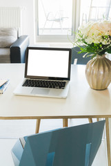 Work desk with notebook, copy space on blank screen