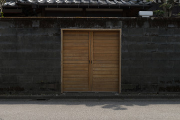 sidewalk by street wall & door