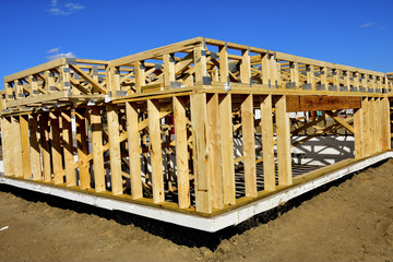 Obraz premium New wood frame home under construction.