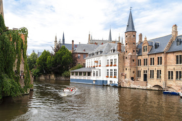 Fototapeta premium Touristic Boats on Brugge Canal