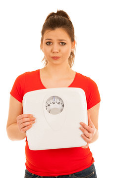 woman holding a scale isolated over white background