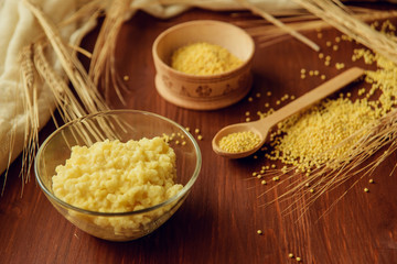 porridge kuskus couscous with bulgur isolated on white