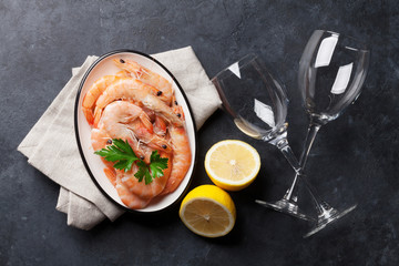 Fresh seafood on stone table. Shrimps
