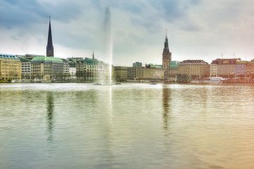 Lake with a fountain and a ships, center of Hamburg, Germany