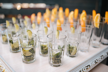 Rows of empty glasses prepared for reception