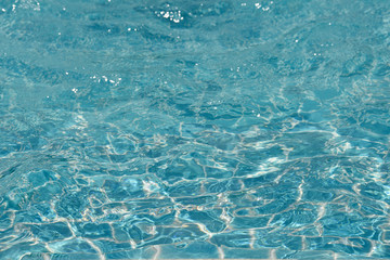 Close-up purified water surface and motion, Selective focus water surface in swimming pool