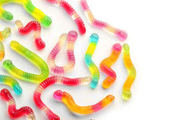 Tasty jelly worms on white background