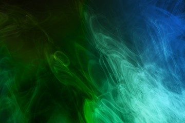 Obraz na płótnie Canvas Green and blue smoke