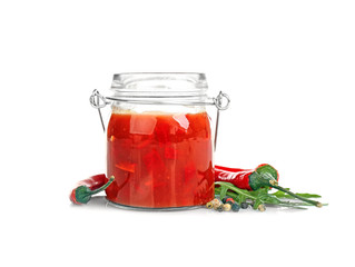 Composition with tasty chili sauce on white background