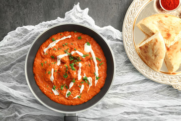 Murgh Makhani in frying pan on table