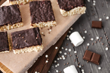 Delicious crispy dessert on wooden background