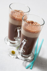 Refreshing iced coffee drink with whipped cream: freddoccino, frappuccino
