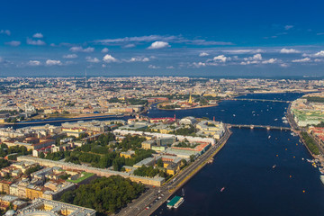 Fototapeta na wymiar Vasilievsky Island. Summer day. View from the cockpit of the helicopter. St. Petersburg from the heights.