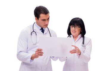 Fototapeta premium Two doctors isolated on the white background