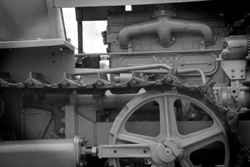 Obraz premium Tractor caterpillar part close up