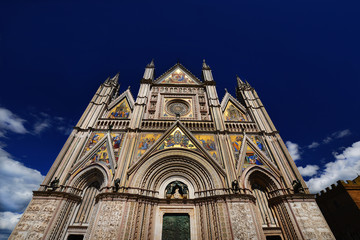 Fototapeta na wymiar Orvieto gothic cathedral seen from below