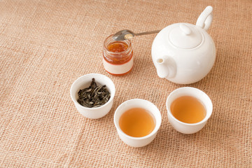 Cup of tea with teapot