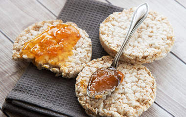 Healthy rice cake with bio jam close up