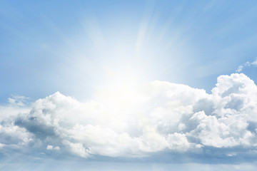 Naklejka na ściany i meble Sun shining in clouds heavenly blue sky