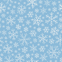 Christmas seamless doodle pattern with snowflakes