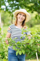 Young woman in garden