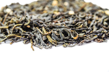 A bunch of dry green unpressed tea with flavors