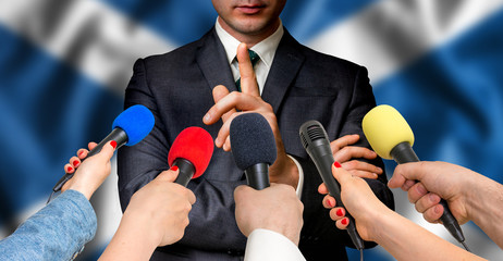 Scottish candidate speaks to reporters - journalism concept