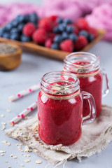 Healthy mixed smoothie for breakfast with berries, blueberry, raspberry