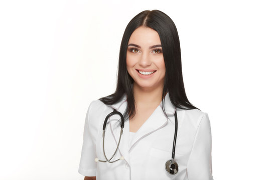 Friendly female doctor - isolated over a white background.