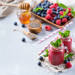 Healthy mixed smoothie for breakfast with berries, blueberry, raspberry