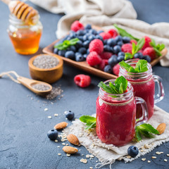 Healthy mixed smoothie for breakfast with berries, blueberry, raspberry