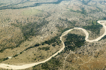 Aerial view somewhere above the Serengeti National Park and the Great Rift Valley - Tanzania Africa