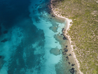 Aerial view of the Sardinian Emerald Coast, with its turquoise sea. Costa Smeralda in Sardinia Island, is one of the most beautiful and famous coasts in the world