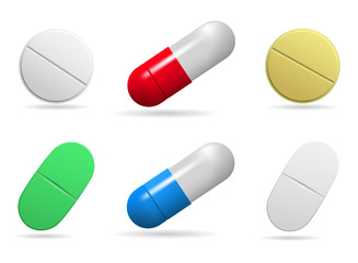 Medicinal tablets. Set of oval, round and capsules tablets of different colors. Isolated objects on white background. Vector .