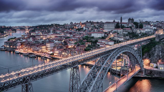 Porto, Portugal: the Dom Luis I Bridge and the old town at night
