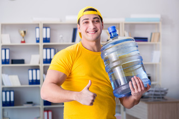 Man delivering water bottle to the office