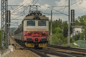 Obraz premium Electric engine and train near Ceske Budejovice town