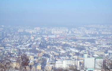 Fototapeta na wymiar View of city from hill in winter