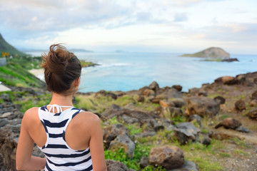 Fototapeta na wymiar Hawaii travel woman tourist looking at makapuu lookout view of Waimanalo beach.