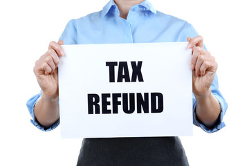 Woman holding paper sheet with text TAX REFUND on white background