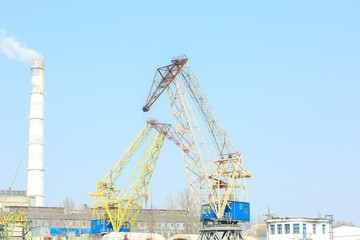 Fototapeta na wymiar Construction crane on blue sky background