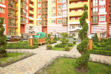 Exterior view of tower block building and yard