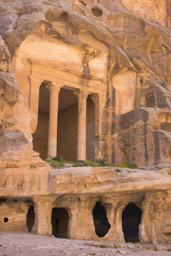 The Ancient Carved Sandstone Columns Of Siq Al Barid, Little Petra, Jordan. Buildings Are Formed From Caves Complete With Cisterns For Water Collection. Little Petra Was Home To The Nabatean People.