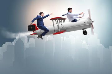 Businessman flying on vintage old airplane